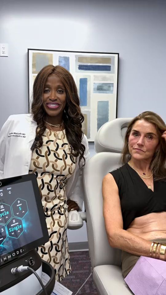 Dr. Kerline Marcelin and a smiling patient in a Hudson Aesthetics MD treatment room